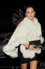 KELLY BROOK Arrives at a Christmas Party