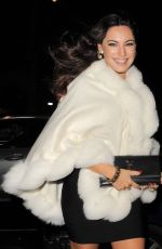 KELLY BROOK Arrives at a Christmas Party