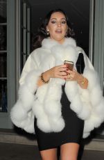 KELLY BROOK Arrives at a Christmas Party