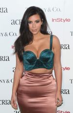 KIM KARDASHIAN at 2014 Acria Holiday Dinner in New York