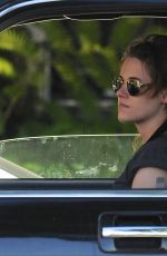 KRISTEN STEWART with a Friend Driving Around in Los Angeles