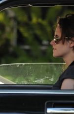 KRISTEN STEWART with a Friend Driving Around in Los Angeles