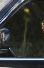 KRISTEN STEWART with a Friend Driving Around in Los Angeles