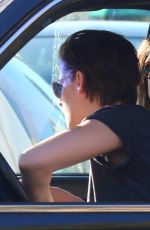 KRISTEN STEWART with a Friend Driving Around in Los Angeles