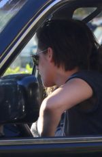 KRISTEN STEWART with a Friend Driving Around in Los Angeles