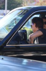 KRISTEN STEWART with a Friend Driving Around in Los Angeles