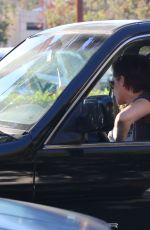 KRISTEN STEWART with a Friend Driving Around in Los Angeles