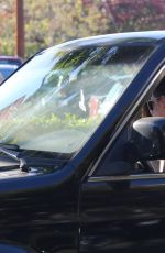 KRISTEN STEWART with a Friend Driving Around in Los Angeles