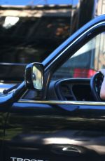 KRISTEN STEWART with a Friend Driving Around in Los Angeles