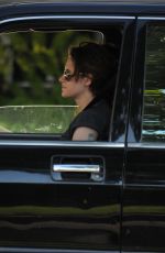 KRISTEN STEWART with a Friend Driving Around in Los Angeles