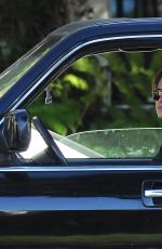 KRISTEN STEWART with a Friend Driving Around in Los Angeles