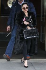 LADY GAGA in Fur Coats Leaves Her Apartment in New York