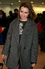 LILY COLLINS at Narita International Airport in Tokyo