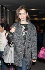 LILY COLLINS at Narita International Airport in Tokyo