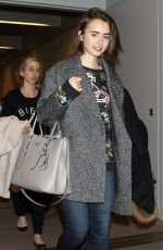 LILY COLLINS at Narita International Airport in Tokyo