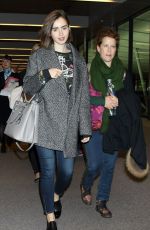 LILY COLLINS at Narita International Airport in Tokyo