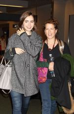 LILY COLLINS at Narita International Airport in Tokyo