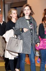 LILY COLLINS at Narita International Airport in Tokyo