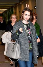 LILY COLLINS at Narita International Airport in Tokyo