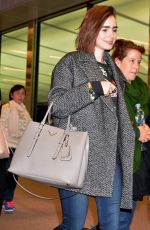 LILY COLLINS at Narita International Airport in Tokyo