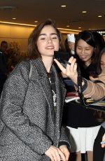 LILY COLLINS at Narita International Airport in Tokyo