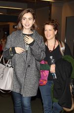 LILY COLLINS at Narita International Airport in Tokyo