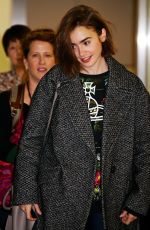 LILY COLLINS at Narita International Airport in Tokyo