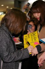 LILY COLLINS at Narita International Airport in Tokyo