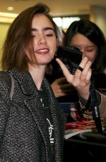 LILY COLLINS at Narita International Airport in Tokyo