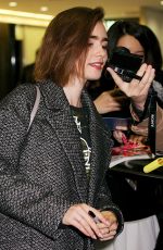 LILY COLLINS at Narita International Airport in Tokyo