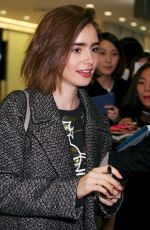 LILY COLLINS at Narita International Airport in Tokyo