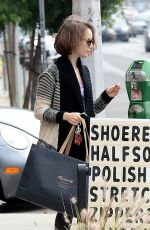 LILY COLLINS Leaves Dry Cleaning in Los Angeles