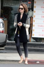 LILY COLLINS Leaves Dry Cleaning in Los Angeles