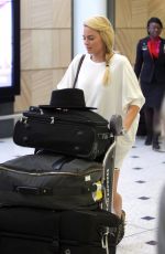 MARGOT ROBBIE Arrives at Airport in Sydney 1212