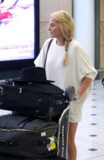 MARGOT ROBBIE Arrives at Airport in Sydney 1212