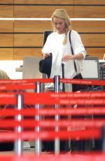 MARGOT ROBBIE Arrives at Airport in Sydney 1212