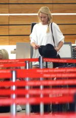 MARGOT ROBBIE Arrives at Airport in Sydney 1212