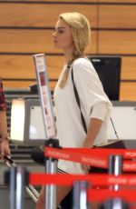 MARGOT ROBBIE Arrives at Airport in Sydney 1212