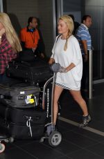 MARGOT ROBBIE Arrives at Airport in Sydney 1212