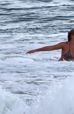 MARGOT ROBBIE in Bikini on the Beach in Byron Bay