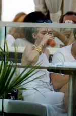 MILEY CYRUS and Patrick Schwarzenegger at a Restaurant in Malibu