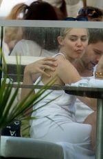 MILEY CYRUS and Patrick Schwarzenegger at a Restaurant in Malibu