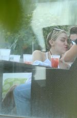 MILEY CYRUS and Patrick Schwarzenegger at a Restaurant in Malibu