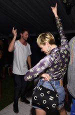 MILEY CYRUS and Patrick Schwarzenegger at Hublot Haute Living Party in Miami