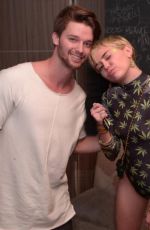 MILEY CYRUS and Patrick Schwarzenegger at Hublot Haute Living Party in Miami