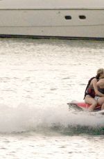 MILEY CYRUS and Patrick Schwarzenegger Jet Skiinng in Miami