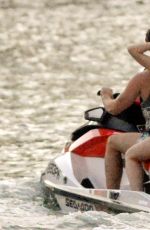 MILEY CYRUS and Patrick Schwarzenegger Jet Skiinng in Miami