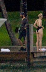 MILEY CYRUS and Patrick Schwarzenegger Jet Skiinng in Miami