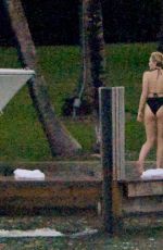 MILEY CYRUS and Patrick Schwarzenegger Jet Skiinng in Miami