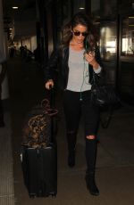 NIKKI REED Leaves Los Angeles International Airport 0912